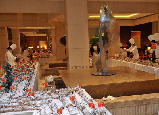 الصين تصنع اطول كعكة لعيد الميلاد المجيد الصين تصنع اطول كعكة لعيد الميلاد المجيد